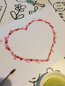 carte avec un coeur tampon